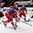 MINSK, BELARUS - MAY 17: Russia's Artyom Anisimov #42 goes to play the puck while Sergei Shirokov #52 Latvia's Rodrigo Lavins #2, Kristaps Sotnieks #11 and Kristers Gudlevskis #50 look on during preliminary round action at the 2014 IIHF Ice Hockey World Championship. (Photo by Andre Ringuette/HHOF-IIHF Images)

